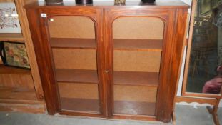 A mahogany book case