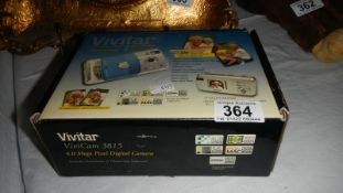 A Vivitar digital camera in box