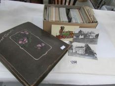 An album and a box of in excess of 400 postcards including railway, shipping, coastal,