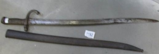 A bayonet in metal sheath