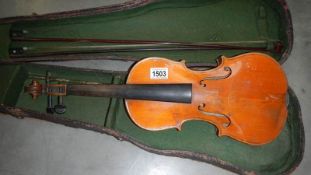 An old violin in case,