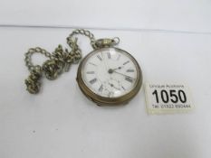 An old pocket watch on chain,