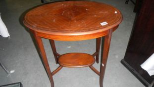 An oval inlaid occasional table