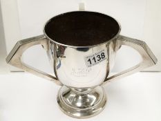 A silver three handled loving cup, Hall Marked for Sheffiled, James Deakin & Sons, 1913-14,