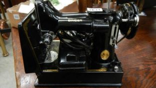 A small Singer sewing machine