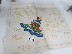 A Royal Artillery embroidered cloth featuring signatures of service men