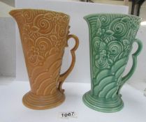 2 Wade jugs being yellow and green with matching pattern