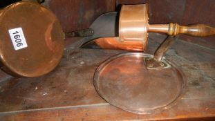 A copper scoop,