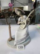 A Lladro girl playing guitar - Sweet song,