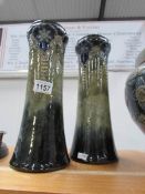 A pair of Doulton Lambeth vases