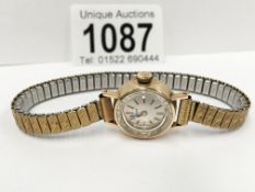 A 9ct gold ladies Tissot watch in working order