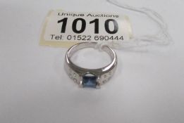 A white gold sapphire and diamond ring,