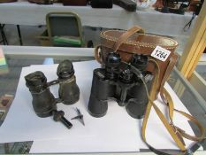 A leather cased pair of binoculars and another a/f pair