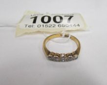 An 18 carat gold 5 stone diamond ring,