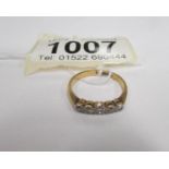 An 18 carat gold 5 stone diamond ring,