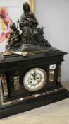 A French marble clock surmounted figural group