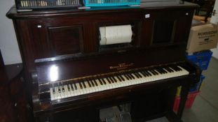 A pianola marked Witton Witton & Co.