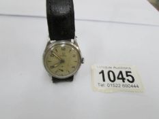 An Omega military style wrist watch (loose back)