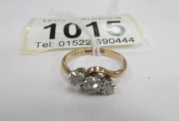 A 3 stone cross over diamond ring,