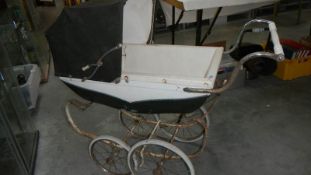 A Silver Cross dolls pram