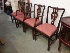 A mahogany carver chair and 3 matching dining chairs
