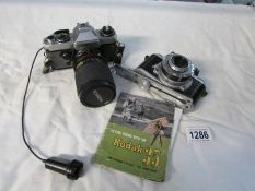 A Yashica camera with 35-105 mm lens and a Kodak 35 camera