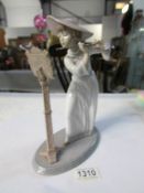 A Lladro girl playing flute - Song bird,