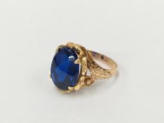 An 18 carat gold blue stone ring,