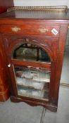 A music cabinet with contents