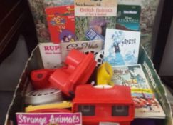 A quantity of vintage view master cameras and reels and 3D viewers and cards