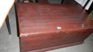 A large stained pine box