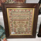 A good framed and glazed sampler dated 1826,