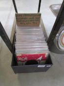 A box of 45 rpm EP records from 50s, 60s and 70s including Elvis Presley,