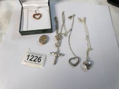 3 silver pendants,