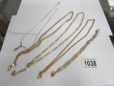 4 gold necklaces and a gold bracelet (all marked 9 ct) approximately 40 grams