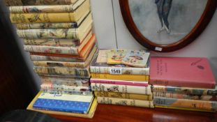 A quantity of books by Enid Blyton including first editions (mainly Famous Five and Adventure