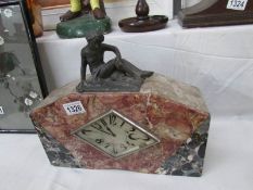 A French marble mantel clock surmounted figure,