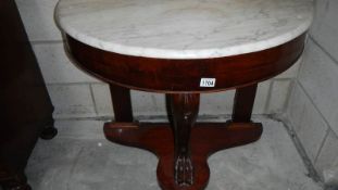 A mahogany marble topped wash stand