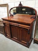 A mahogany mirror backed sideboard