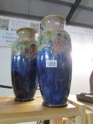 A pair of Doulton Lambeth vases,
