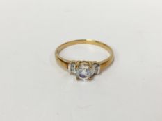 A 9ct gold ring set clear stone, HM Birmingham (no date letter),