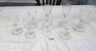 8 assorted etched glasses