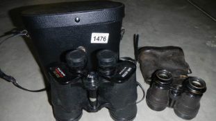 2 pairs of binoculars with cases