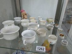 A collection of in excess of 20 miniature chamber pots