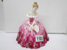 A Royal Doulton figurine "Victoria",