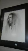 A portrait print of Bob Marley