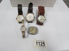 A quantity of old wrist watches