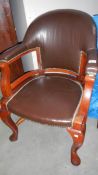 A leather captains chair