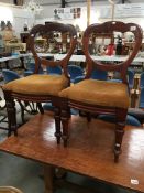 A pair of Victorian mahogany chairs