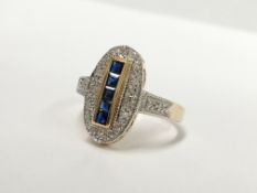 An oval yellow gold sapphire and diamond ring,